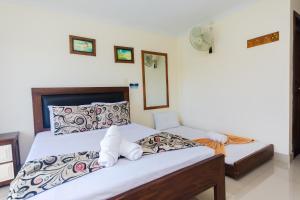 Letto o letti in una camera di Hotel Verony Guatape