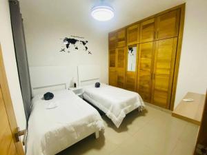 Postel nebo postele na pokoji v ubytování Apartamento Próximo Playa Caleta