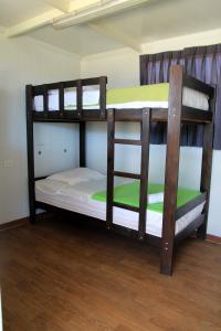 a couple of bunk beds in a room at Bamboo Paracas Resort in Paracas