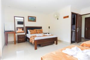 Letto o letti in una camera di Hotel Verony Guatape