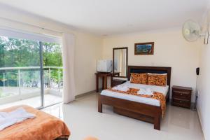 Letto o letti in una camera di Hotel Verony Guatape