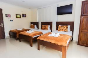 Letto o letti in una camera di Hotel Verony Guatape