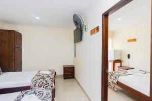 Letto o letti in una camera di Hotel Verony Guatape