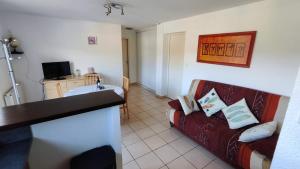 Televízia a/alebo spoločenská miestnosť v ubytovaní Appartement avec une belle vue sur Palalda