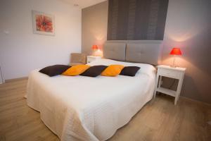 Postel nebo postele na pokoji v ubytování Chambre d'hôtes Les Bruyères