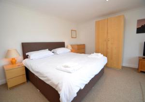 Postel nebo postele na pokoji v ubytování Inglewood Apartments
