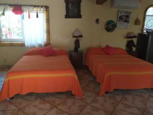 Letto o letti in una camera di Hacienda Jaqueline