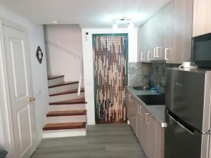 A kitchen or kitchenette at Castillo Mar- Casa Martini