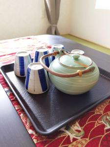 a black tray with a pot on top of a table at belle via tokyo - Vacation STAY 60795v in Tokyo