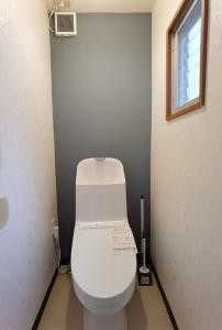 a bathroom with a white toilet in a stall at belle via tokyo - Vacation STAY 60795v in Tokyo