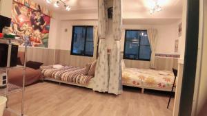 Ένα ή περισσότερα κρεβάτια σε δωμάτιο στο Jing House Koiwa - Vacation STAY 63200v