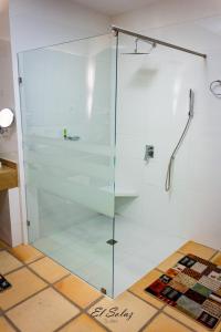a glass shower stall in a bathroom at Hospedaje campestre - El Solaz Suites in Villa de Leyva