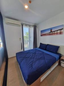 Postel nebo postele na pokoji v ubytování Lovely apartment in Bang Tao - Zcape X2 Condo