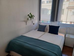 Postel nebo postele na pokoji v ubytování Apartment Ganymede
