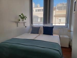 Postel nebo postele na pokoji v ubytování Apartment Ganymede
