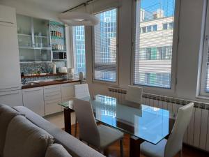 Kuchyň nebo kuchyňský kout v ubytování Apartment Ganymede