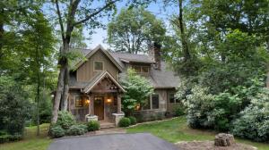 a house with a driveway in front of it at Timberwalk Cottage - Blowing Rock Luxury Cabin with Hot Tub and Fireplaces in Blowing Rock