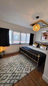 A bed or beds in a room at DS39 - A Sexy & Stylish 2 bedroom Apartment with Private Terrace in the centre of Hasselt