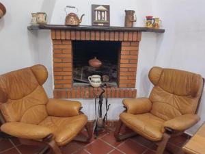 Ruang duduk di Casa en el valle de GuainosAltos