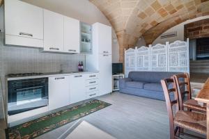 A kitchen or kitchenette at Residence Castello