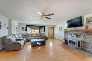 a living room with a couch and a fireplace at Williams AZ Vacation Home in Williams