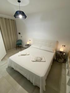 Casa vacanza Scala dei Turchi tesisinde bir odada yatak veya yataklar