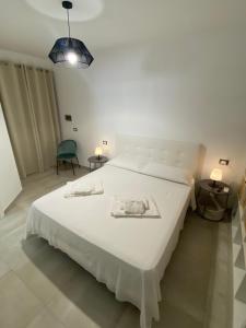 Postel nebo postele na pokoji v ubytování Casa vacanza Scala dei Turchi