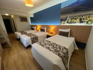 Postel nebo postele na pokoji v ubytování Hotel El Tambo 2