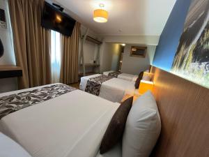 Postel nebo postele na pokoji v ubytování Hotel El Tambo 2