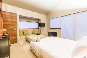 Letto o letti in una camera di Club Wyndham Dinner Plain, Trademark Collection by Wyndham