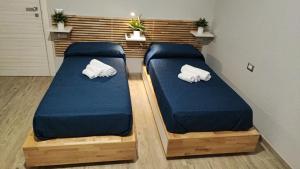 Säng eller sängar i ett rum på Pietrapantone B&B
