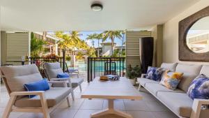 Posezení v ubytování AZURE 187 Port Douglas