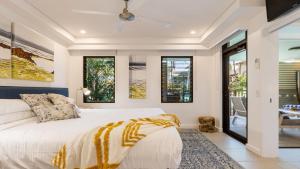 Postel nebo postele na pokoji v ubytování AZURE 187 Port Douglas