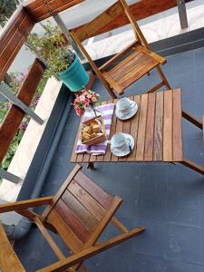 an overhead view of a table and chair on a patio at Los Jazmines in San Salvador de Jujuy