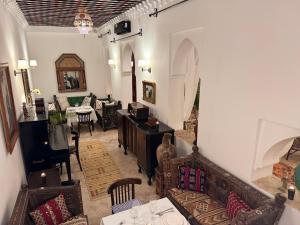 Posezení v ubytování Riad Al-Qurtubi
