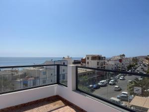 a balcony with a view of the ocean at Surfside Studio in Taghazout 2-3px in Taghazout
