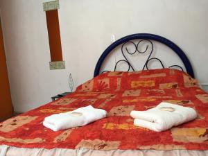 Postel nebo postele na pokoji v ubytování Habitacion privada en Centro Lopez Mateos con Aire Acondicionado Oficina Estacionamiento