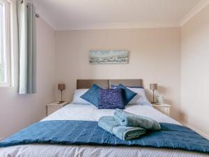 Postel nebo postele na pokoji v ubytování Steyning Kilns