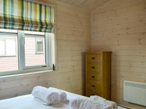 Ein Bett oder Betten in einem Zimmer der Unterkunft Bransty
