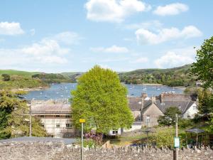 a view of a town with a river and boats at Devon Court 2 in Salcombe