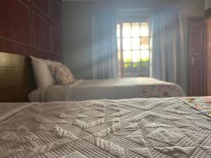 Postel nebo postele na pokoji v ubytování PASEO REAL HOTEL BOUTIQUE