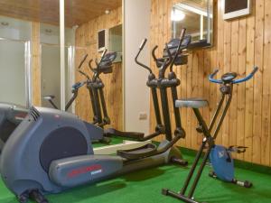 a gym with several exercise bikes in a room at Th Hollow in Bishops Lydeard