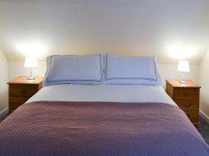 Postel nebo postele na pokoji v ubytování Arnish Cottage