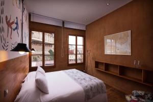 Letto o letti in una camera di Fauna Hotel
