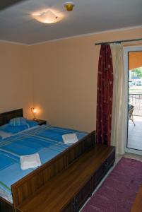 Postel nebo postele na pokoji v ubytování Korona Home + 21 fotografií