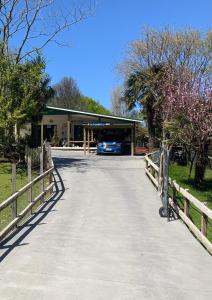 a car parked in front of a garage at Union Street Hideaway in Waihi