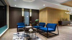Χώρος καθιστικού στο Forest Hills Hotel