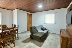 Μια τηλεόραση ή/και κέντρο ψυχαγωγίας στο Chalé do Litoral