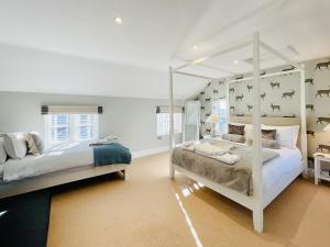 מיטה או מיטות בחדר ב-Gilbertson Cottage