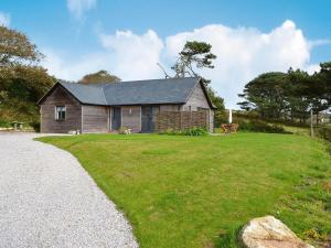 a house with a grassy yard in front of it at The Perch-uk12929 in St. Just